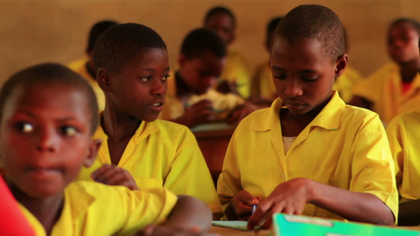 KENYA, AFRICA - CIRCA 2011: Close up of school boys in class in Kenya, Africa.