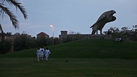 Muharraq, CIRCA April 2016: Falcon Statue in Arad Walkway at night, Muharraq. Bahrain 04.