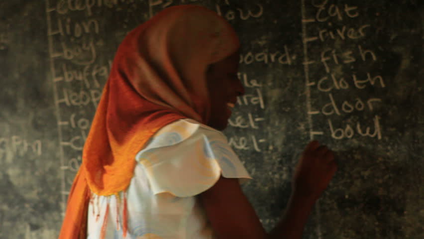 KENYA, AFRICA - CIRCA 2011: Close up of the teacher in full classroom in Kenya,