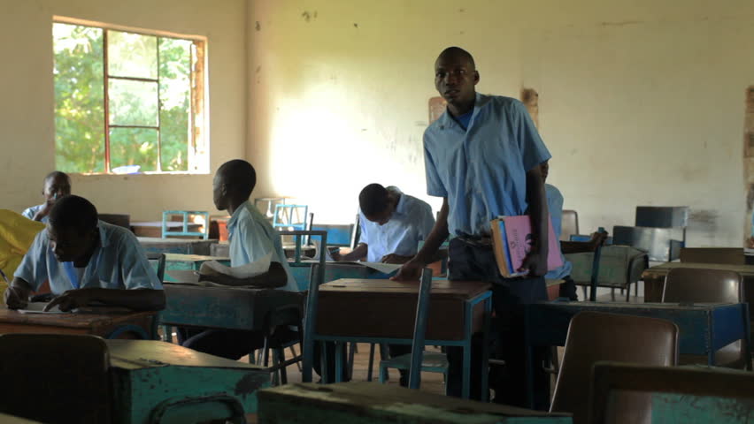 KENYA, AFRICA - CIRCA 2011: Classroom of about 6 school boys in Kenya, Africa.