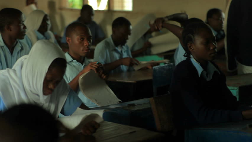 MOMBASSA, KENYA, AFRICA - CIRCA 2011: Students taking a test in class in a
