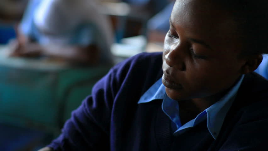 MOMBASSA, KENYA, AFRICA - CIRCA 2011: Students taking a test in class in a