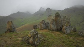 4k video of mountain landscape on rainy day with clouds coming over, Dobrogea, Romania