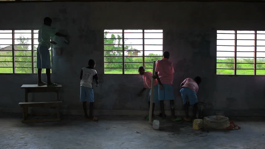 MOMBASSA, KENYA, AFRICA - CIRCA 2011: Painting the interior of a school in a