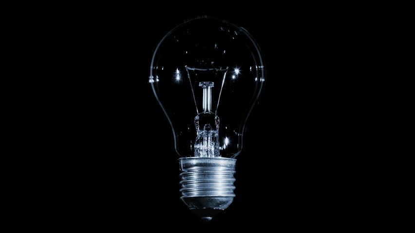 Tungsten light bulb lamp blinking over black background, macro view, loop ready Royalty-Free Stock Footage #17258128