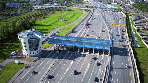 RUSSIA ST.PETERBURG- 28 MAY 2016: Aerial view of highway with Cars at modern toll road turnpike, entry fee pay gate