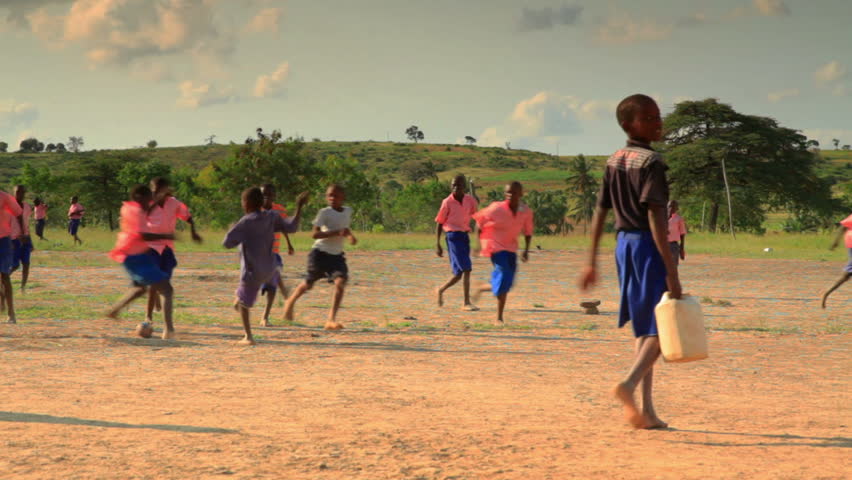 MOMBASSA, KENYA, AFRICA - CIRCA 2011: Boys playing during recess near a village