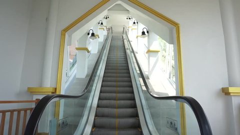 moving escalator up, mecanic, electic, Stair and escalators in a public area. hd footage 1080