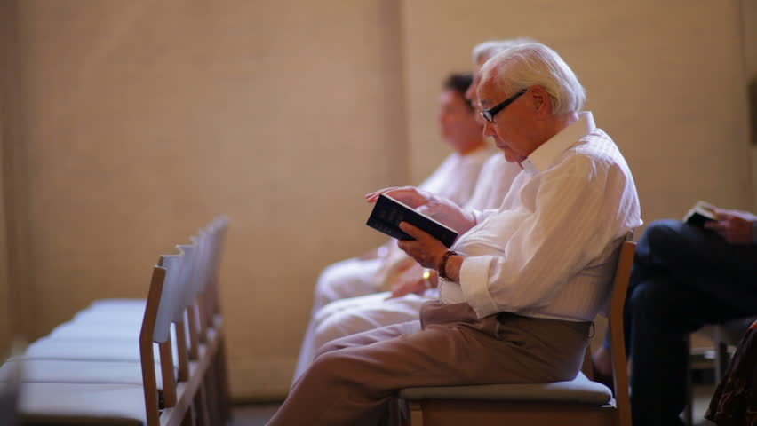 DENMARK - JULY 2010: Elderly man in church in Copenhagen, Denmark