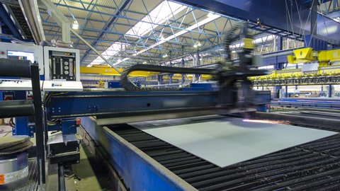 Industrial Laser cutting processing manufacture technology of flat sheet metal steel material with sparks timelapse hyperlapse