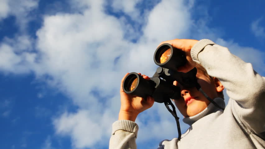 look through binoculars