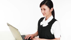 Business woman working on a laptop