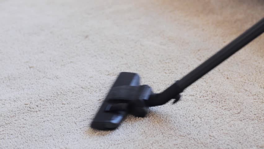 People, housework and housekeeping concept - woman with vacuum cleaner cleaning carpet at home | Shutterstock HD Video #17281213
