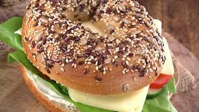 Portion of rotating Bagel with Cheese (not loopable) as 4K UHD footage