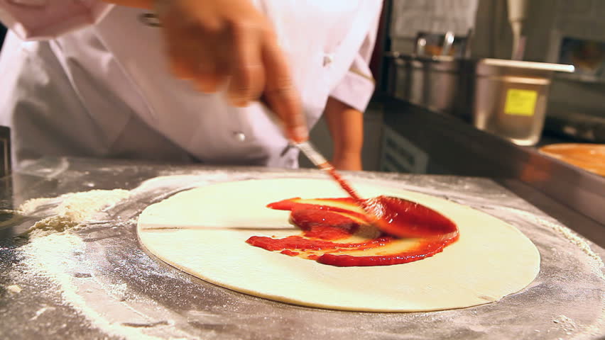 Chef plaster pastry for pizza