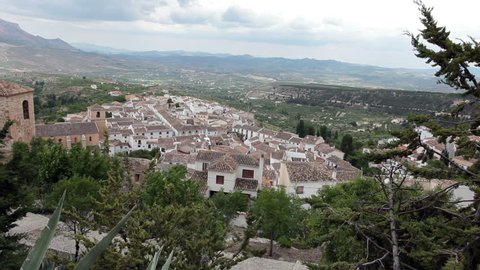 Beautiful mountain and valley town of Velez Blanco. Mountain valleys with the Moorish castle high over looking the entire area. View from renaissance Alcazaba Moorish castle