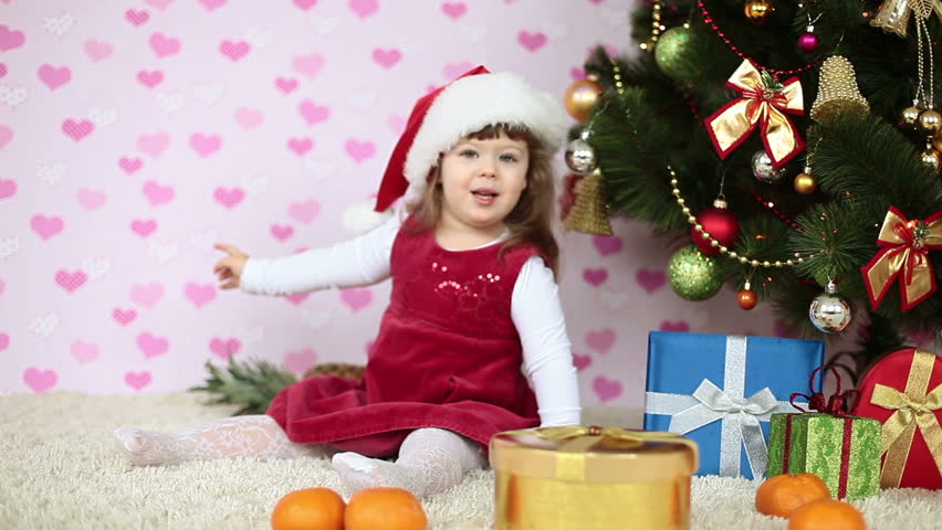 Baby girl doll in Santa hat