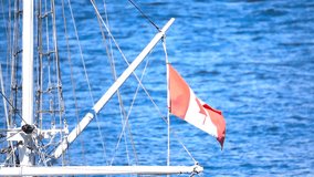 Canadian Flag In Super Slo Motion on a Boat in the Harbour