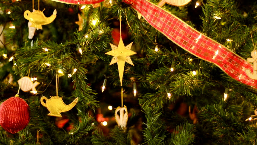 Decorations hanging on a Christmas tree.