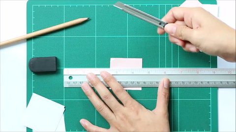 Cutting paper on cutting mat