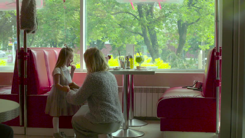 Young Mother Fixes her Daughter