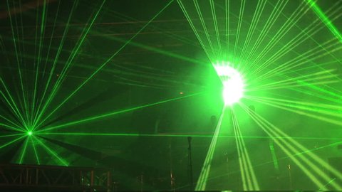 Colored laser light show in a club