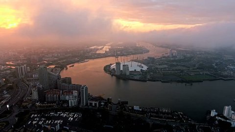 4K Aerial View Above London O2 Arena by The River Thames with Beautiful Sunrise at Dawn Time - Ultra HD