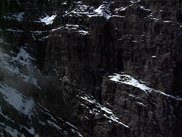 Close fly past mountain face