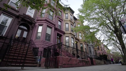 A view of Brooklyn's iconic Brownstone homes from the view of the street. New York - April 1, 2016