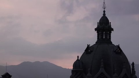 Time lapse of the evening sky against the peak of the Cathedral Metropolitana de Medellin 