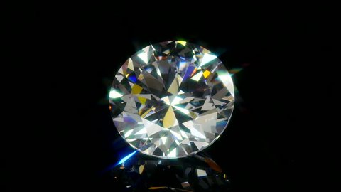 A single perfect diamond rotating slowly above a glossy black surface with sparkling highlights. Seamless High Definition Movie.