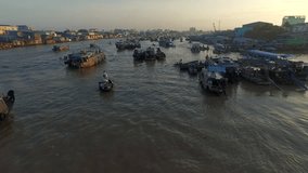 Aerial video from above, over a traditional floating market, in south of Vietnam