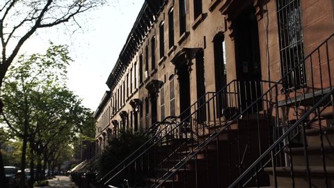 A view of Brooklyn's iconic Brownstone homes from the view of the street. New York - April 1, 2016