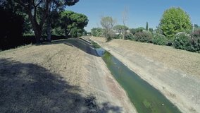 Drone video of a drainage ditch. N.
Video about the gutter, pollution, water, irrigation, delta, river, pond, lake, dam, aerial