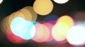 Night lights city blurred traffic. Defocused background. Bokeh lens effects. Full HD 1080p - Powered by Shutterstock - Get 15% off with code: PIKWIZARD15