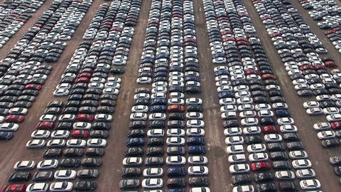 Aerial view of storage parking with new unsold cars