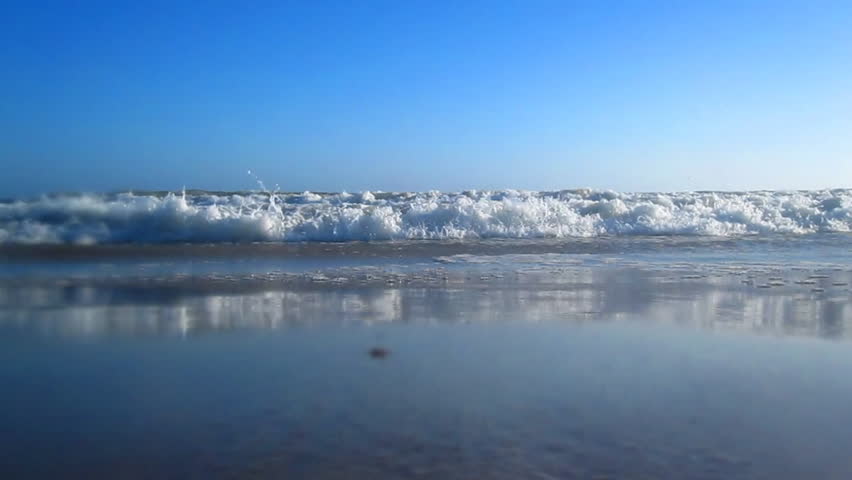 Ocean Waves Wash Up Onto Camera