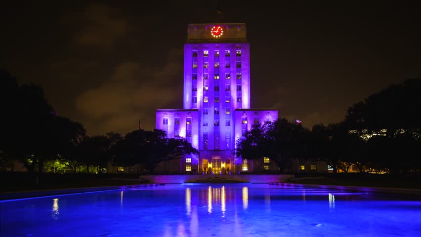 Houston, Texas City Hall building lit up at night with reflecting pool, timelapse