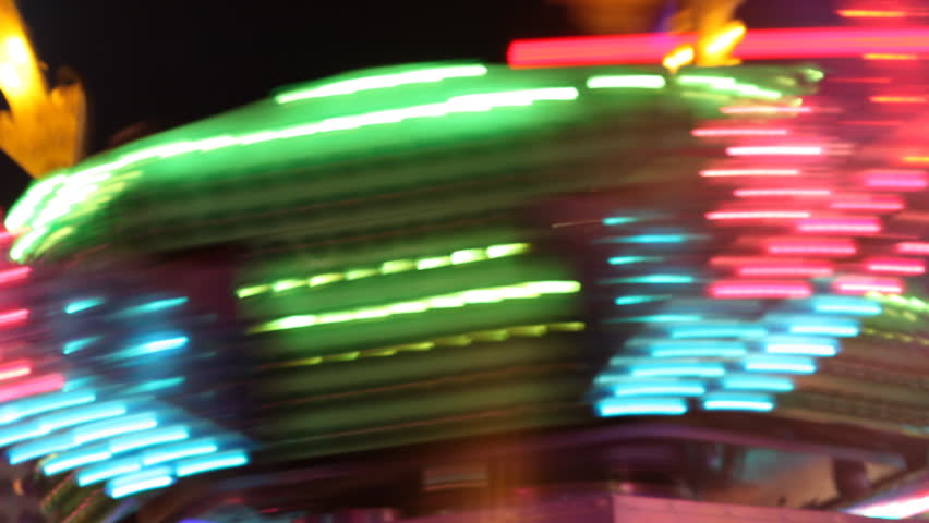 Carnival Ride with Light Flashing Abstract Streaks