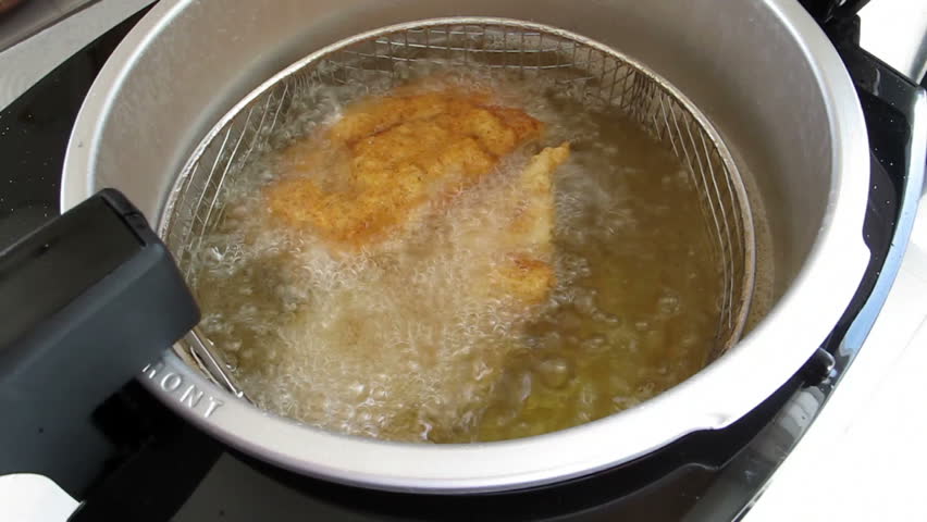 Deep Fryer Cooking Chicken in Vegetable Oil