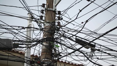 Third world country electrical wires. Disorganized electrical wiring