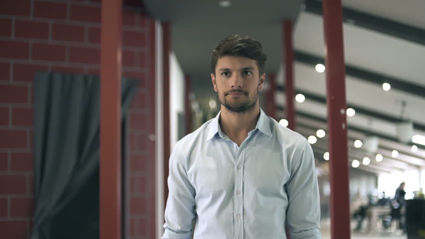 Young businessman greets with his office collegue