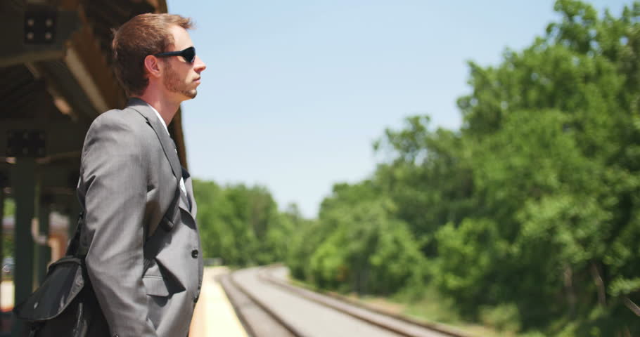 Young Business Man Waiting at Train Station Commuting to Work, 4K