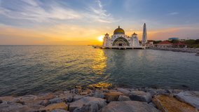 Time lapse. Sunset at Floating Mosque, Straits of Malacca. 4K Video. No Camera Motion.