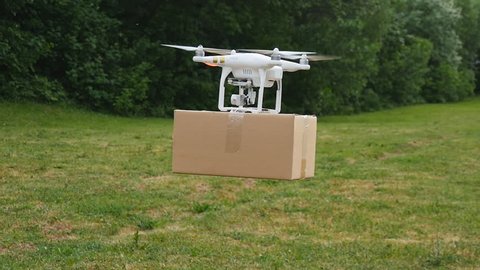 Ufa, Russia. - June 6: Drone delivers parcel June 6, 2016 in Ufa, Russia