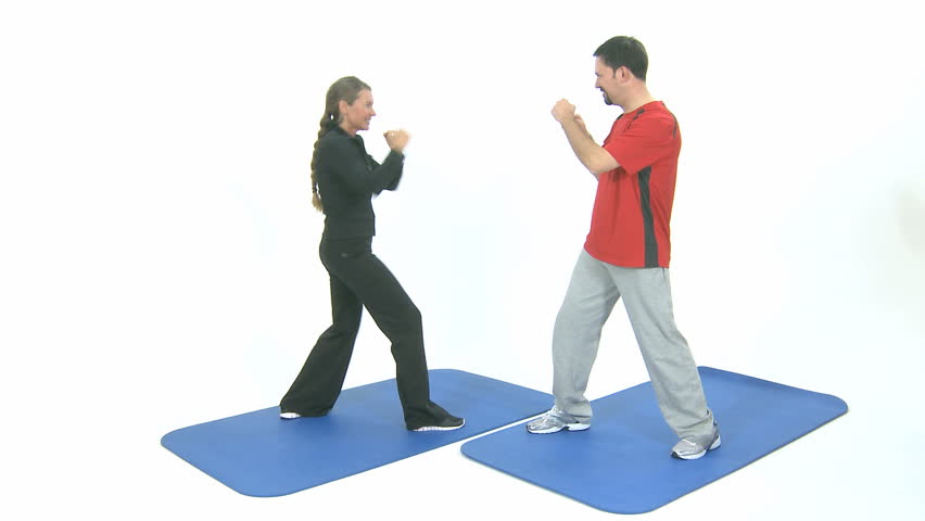 male and female are air boxing for fitness