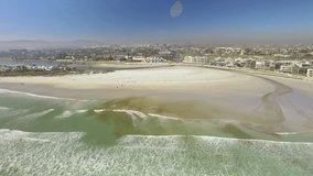 4K UHD aerial video  of Lagoon beach hotels in Tableview, Blouberg. Ocean waves and beaches of South Africa. Part 4 of 8