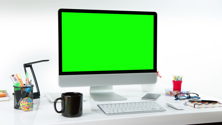Desktop computer with colorful office elements. Lateral dolly. Chroma Key. Perfect to put your own images or videos. Track with perspective corner pin.    Royalty-Free Stock Footage #17421136