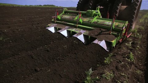 Agriculture tractor seeding plants