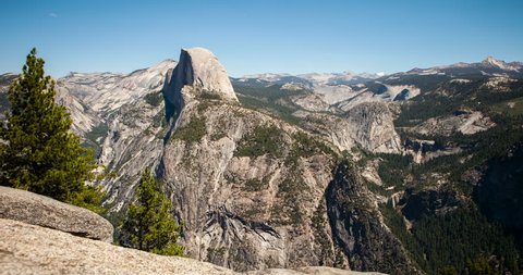 Yosemite National Park, California, USA - view of Yosemite valley with Half Dome from Glacier Point with blue clear sky and moving shadows - Timelapse without motion - August 2013